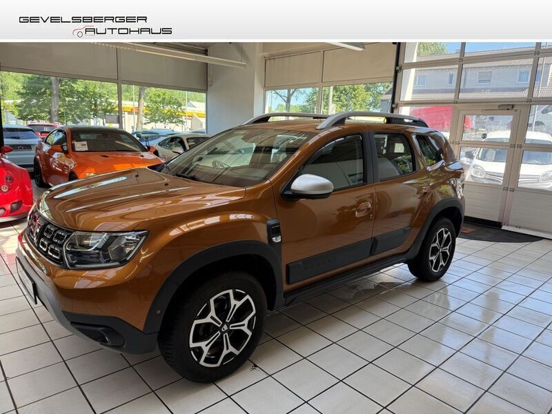 Atacamaorange Gebraucht 2018 Dacia Duster Prestige SUV | 16.980 € (Etwas zu teuer) - Bild 1/4