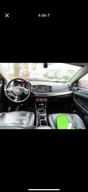 Second-hand Mitsubishi Lancer 140 CP (102 kW) 2009 Negru Berlinǎ