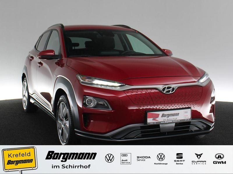 Rot / pulse red Gebraucht 2020 Hyundai Kona Premium SUV | 23.884 € (Etwas zu teuer) - Bild 1/4