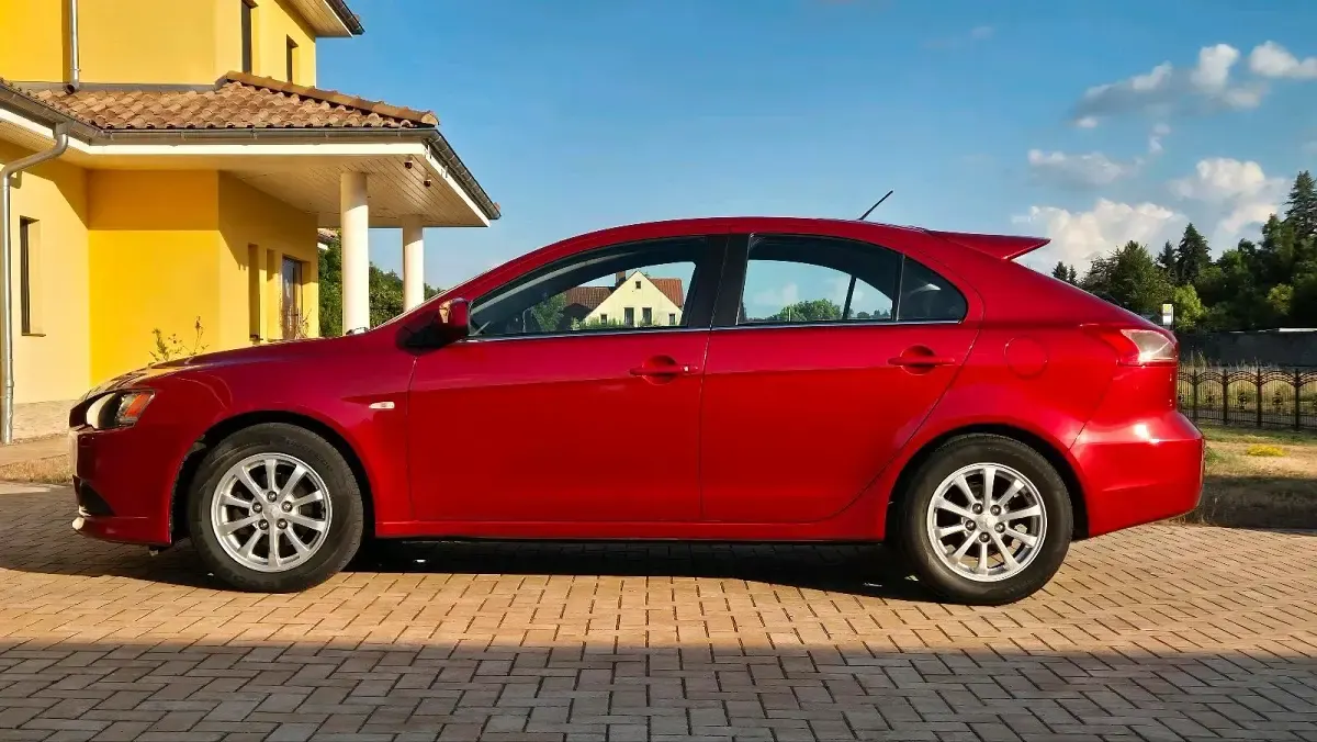 Gebraucht Mitsubishi Lancer Top 150 PS (110 kW) 2011 Rot Limousine