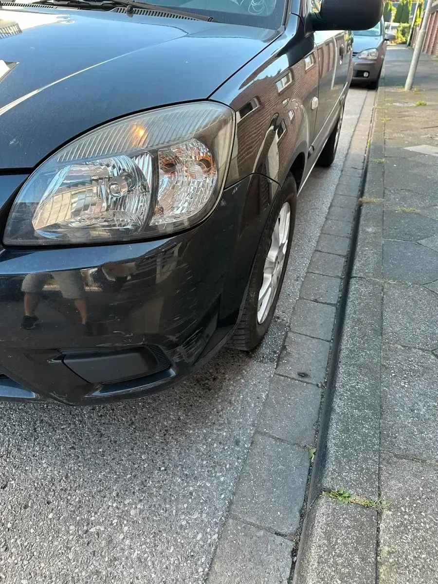 Gebraucht Kia Rio 97 PS (71 kW) 2010 Schwarz Kleinwagen