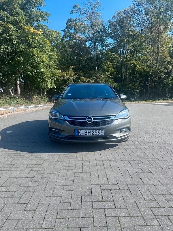 Grau Gebraucht 2016 Opel Astra Innovation Kombi | 6.299 € (Fairer Preis) - Bild 1/4