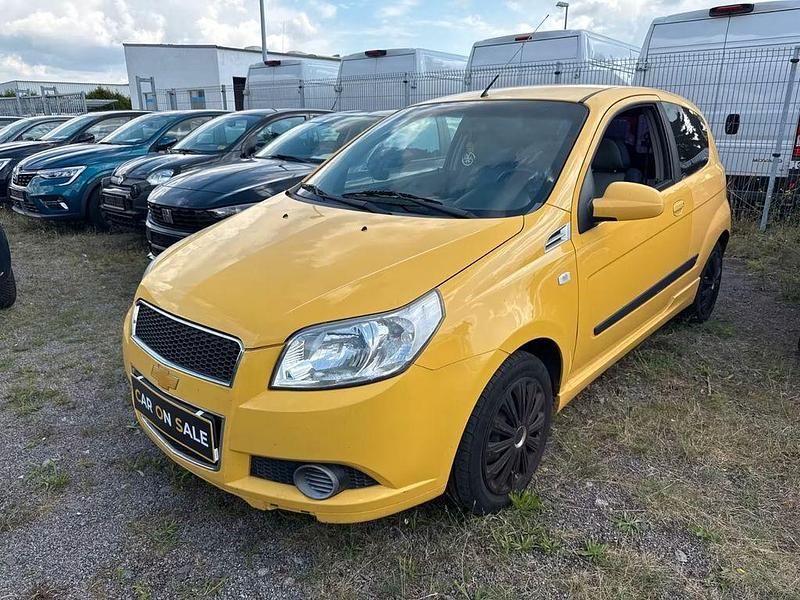 Gelb Gebraucht 2010 Chevrolet Aveo LS Kleinwagen | 2.499 € (Fairer Preis) - Bild 1/4