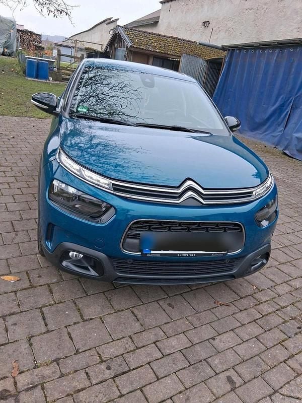 Grün Gebraucht 2019 Citroën C4 SUV | 8.999 € (Fairer Preis) - Bild 1/4