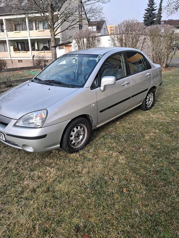 Silber Gebraucht 2002 Suzuki Liana Limousine | 1.755 € (Fairer Preis) - Bild 1/4