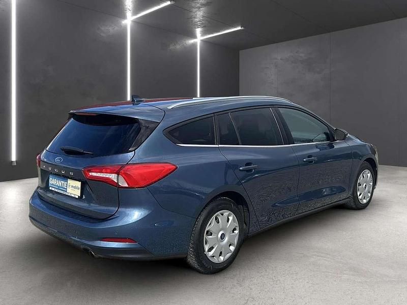 Gebraucht Ford Focus Titanium 125 PS (91 kW) 2021 Chromablau metallic (metallic) Kombi
