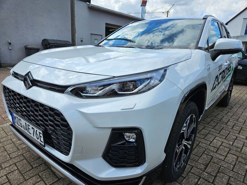 Platinum white pearl met Neu 2024 Suzuki Across Comfort+ SUV | 46.990 € - Bild 1/4