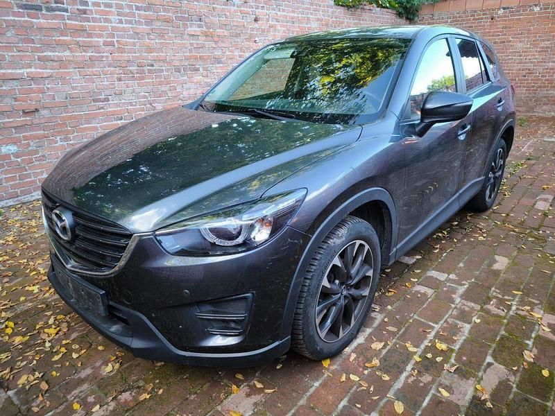 Graphitgrau metallic Gebraucht 2016 Mazda CX-5 Sports-Line SUV | 9.890 € - Bild 1/4