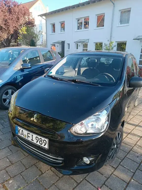 Gebraucht Mitsubishi Space Star Diamant Edition 71 PS (52 kW) 2014 Schwarz Van / Kleinbus