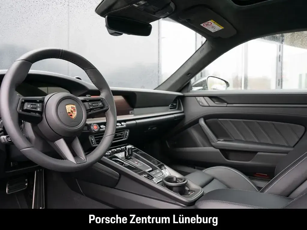 Gebraucht Porsche 992 541 PS (397 kW) 2026 Aventuringrünmetallic Coupé