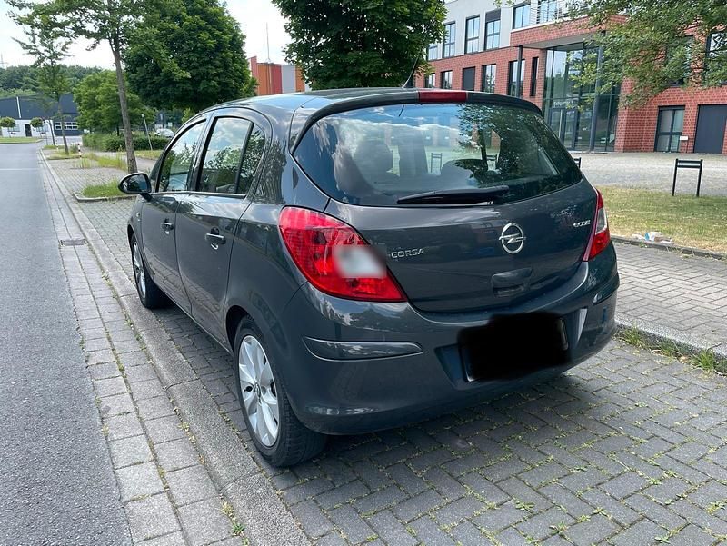 Używany Opel Corsa 69 KM (50 kW) 2012 Szary Hatchback