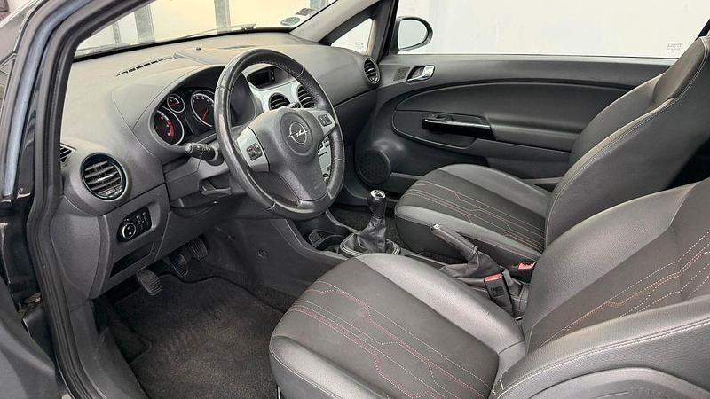 Używany Opel Corsa 87 KM (63 kW) 2013 Czarny Hatchback