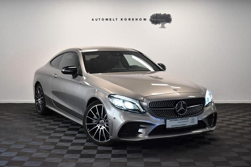 Mojavesilber Gebraucht 2018 Mercedes C300 AMG line Coupé | 33.400 € (Fairer Preis) - Bild 1/3