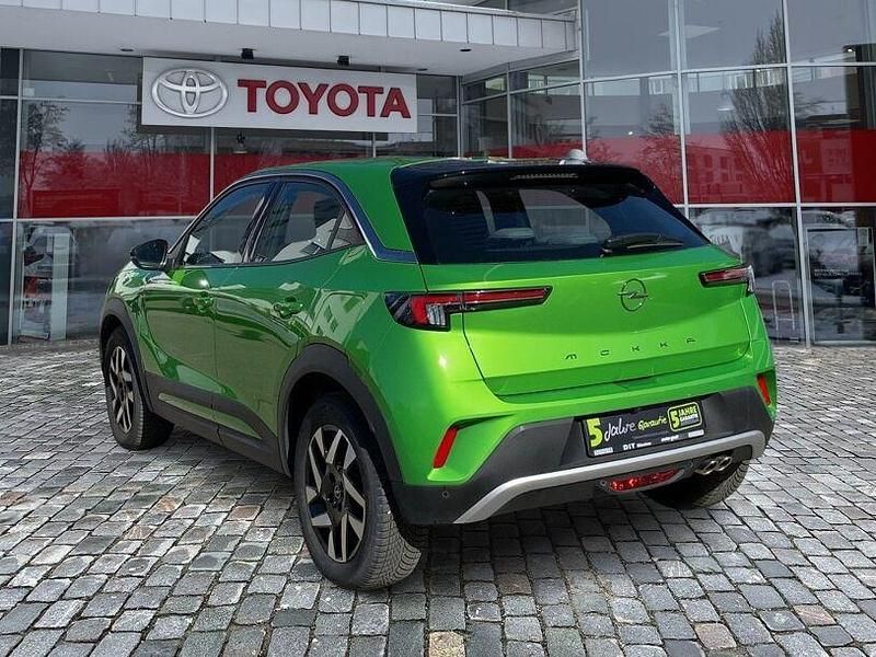 Gebraucht Opel Mokka Elegance 131 PS (96 kW) 2023 Matcha green/ikone gruen SUV