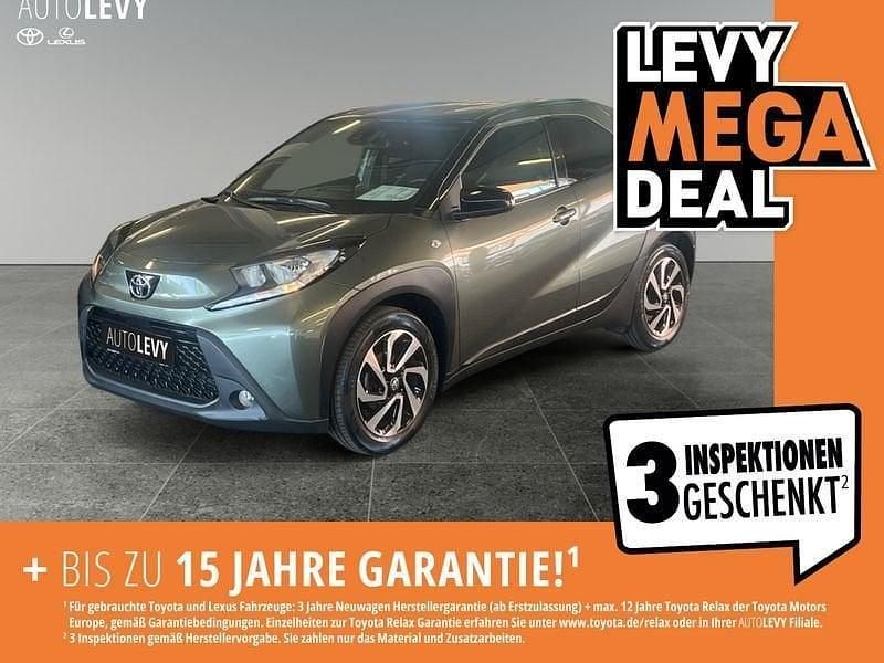 Grün Gebraucht 2023 Toyota Aygo Pulse Kleinwagen | 16.890 € (Fairer Preis) - Bild 1/4