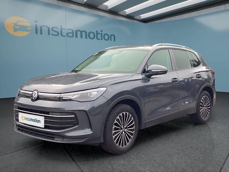 Grau Gebraucht 2024 VW Tiguan SUV | 33.199 € (Fairer Preis) - Bild 1/4