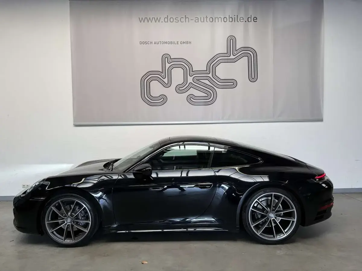 Gebraucht Porsche 911 Carrera 4 385 PS (283 kW) 2020 Tiefschwarz Coupé