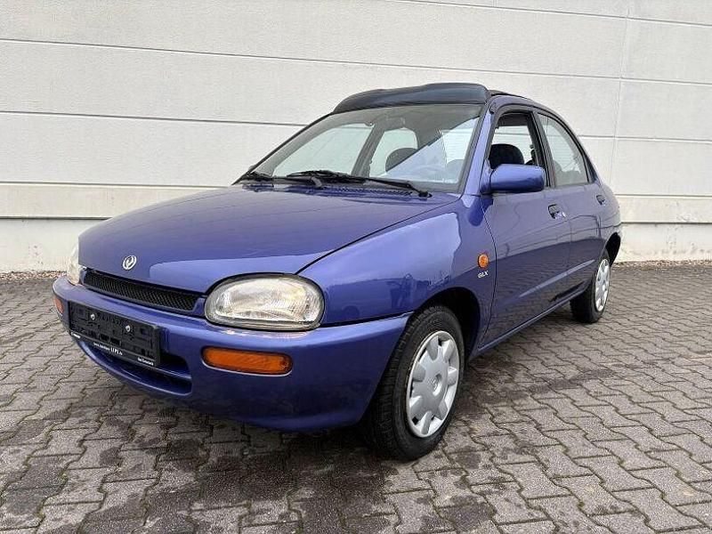 Gebraucht Mazda 121 72 PS (52 kW) 1995 Violett Limousine