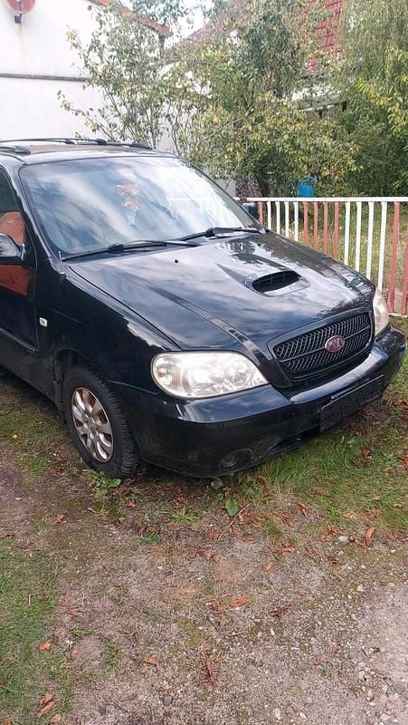 Schwarz Gebraucht 2005 Kia Carnival Van / Kleinbus | 950 € (Superpreis) - Bild 1/4