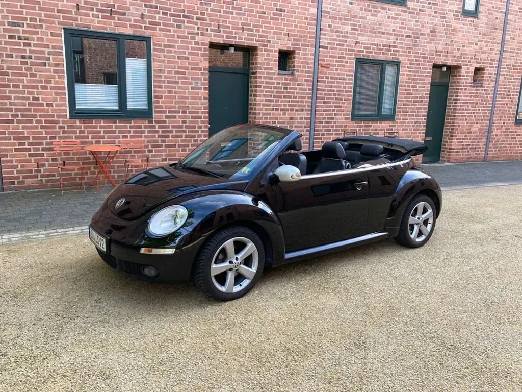 Gebraucht VW New Beetle 102 PS (75 kW) 2010 Schwarz Kleinwagen