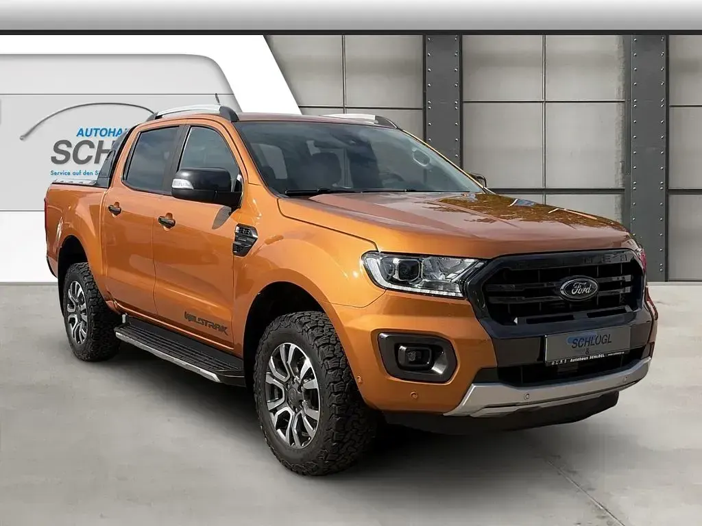 Gebraucht Ford Ranger Wildtrack 212 PS (155 kW) 2023 Canyonorange metallic (metallic) Pickup