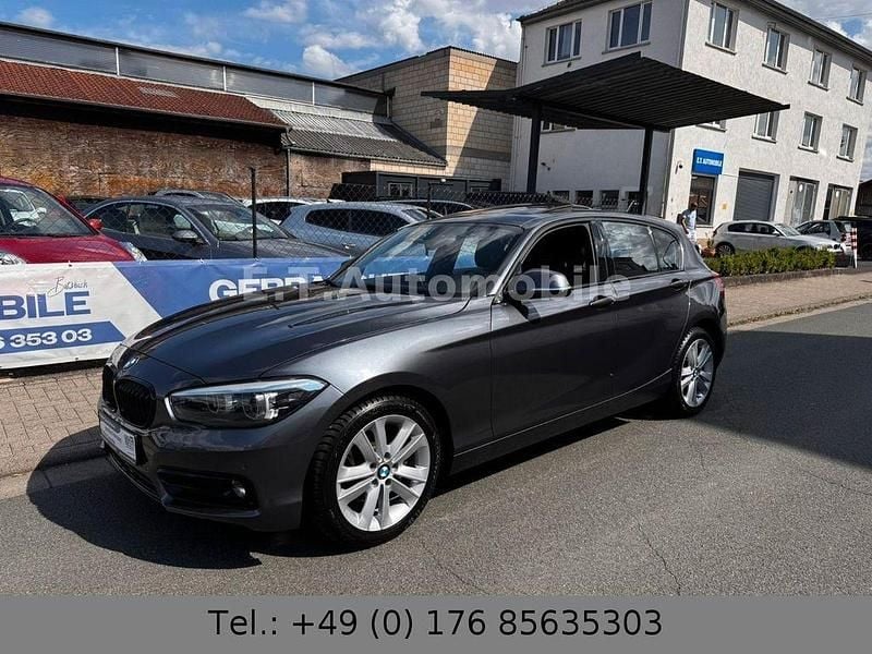 Grau Gebraucht 2018 BMW 118 Sport Line Kleinwagen | 16.299 € (Fairer Preis) - Bild 1/4