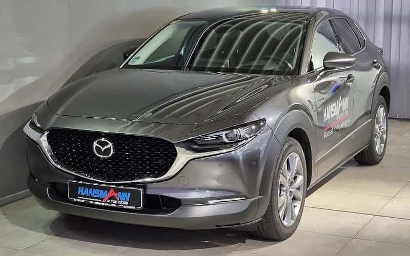 Grau Gebraucht 2024 Mazda CX-30 Exclusive SUV | 30.490 € - Bild 1/4