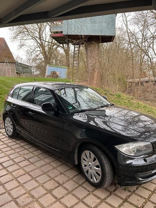 Second-hand BMW 116 122 CP (89 kW) 2010 Negru Hatchback
