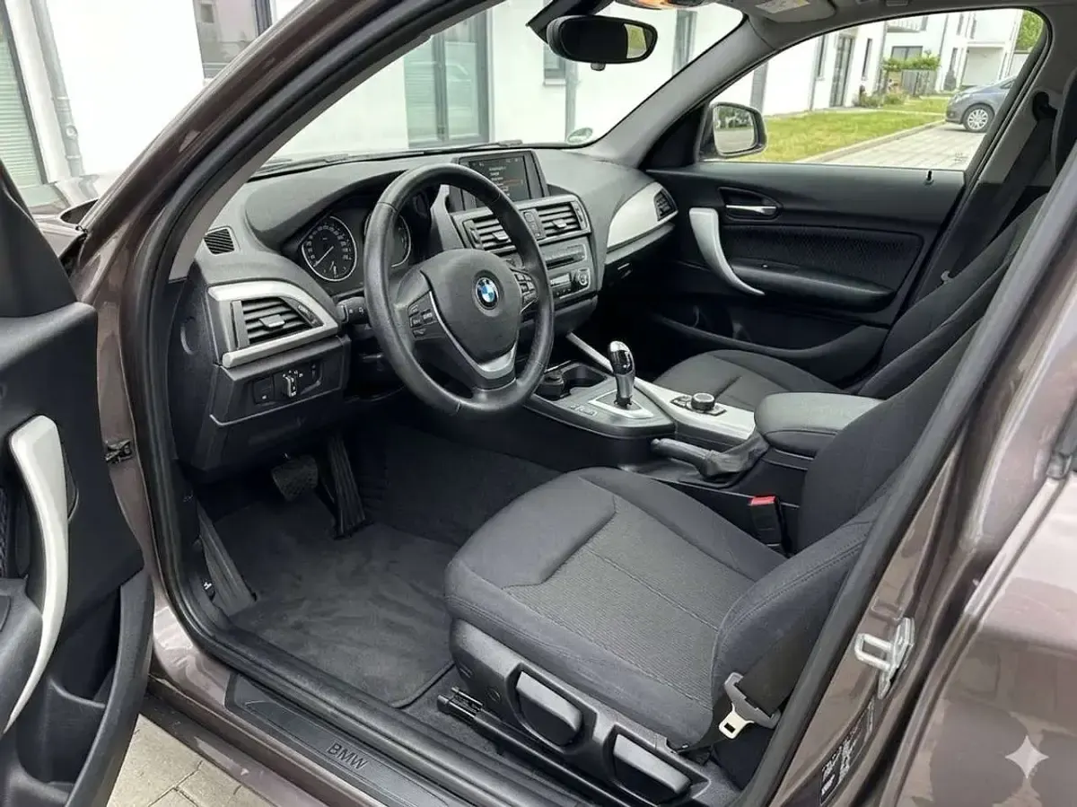 Gebraucht BMW 114 102 PS (75 kW) 2014 Braun Kleinwagen