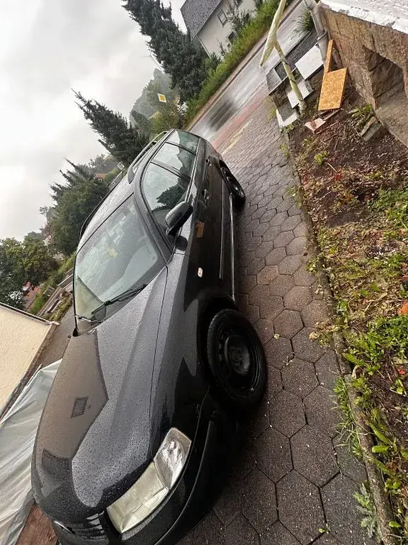 Gebraucht VW Passat Basis 101 PS (74 kW) 1998 Schwarz Kombi