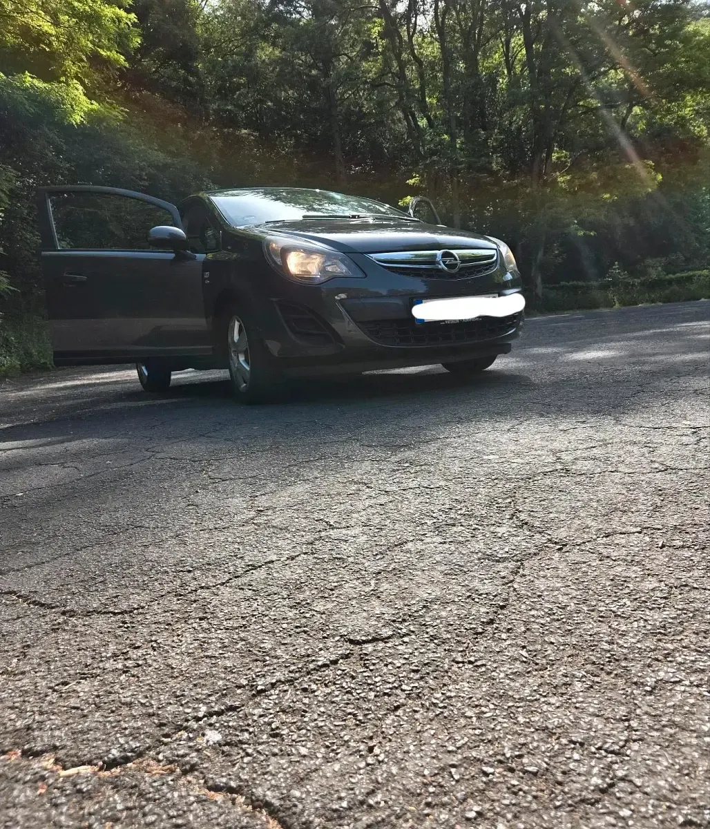 Gebraucht Opel Corsa 87 PS (63 kW) 2013 Grau Kleinwagen