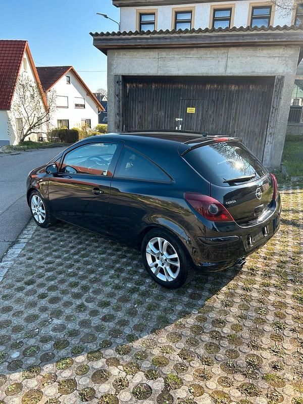 Second-hand Opel Corsa 90 CP (66 kW) 2009 Negru Hatchback