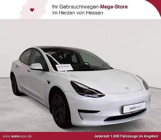 Pearl white multicoat Gebraucht 2021 Tesla Model 3 Standard Range Plus Limousine | 20.989 € (Superpreis) - Bild 1/4