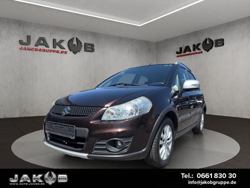 Braun Gebraucht 2013 Suzuki SX4 SUV | 8.490 € (Fairer Preis) - Bild 1/2
