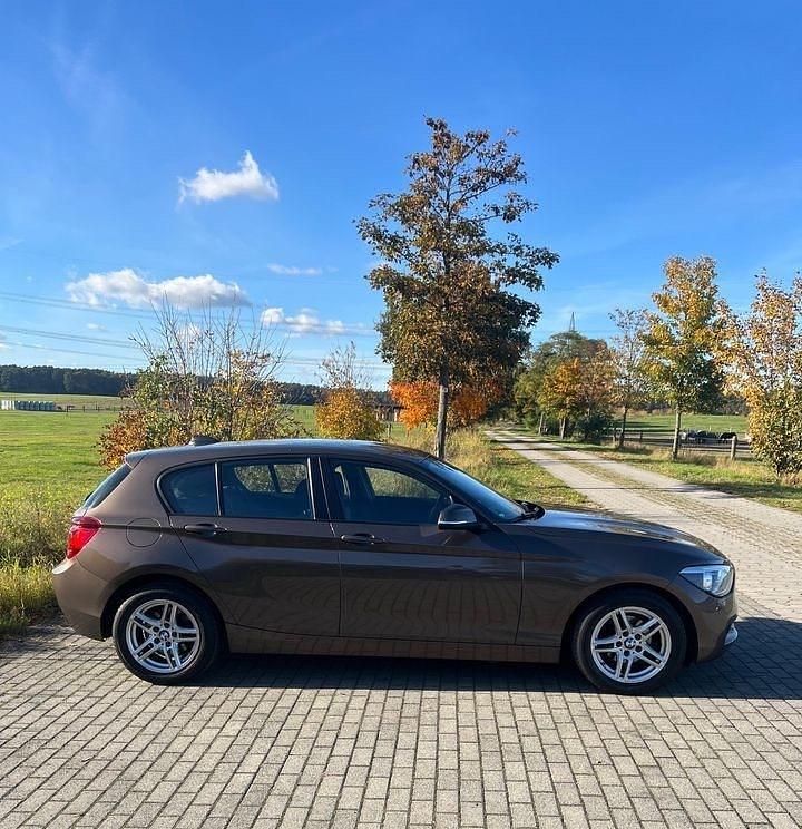 Braun Gebraucht 2014 BMW 116 Kleinwagen | 6.999 € (Guter Preis) - Bild 1/4