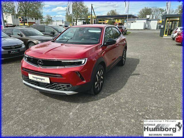 Power rot/kosmos rot (metallic) Gebraucht 2023 Opel Mokka Elegance SUV | 22.790 € (Fairer Preis) - Bild 1/4