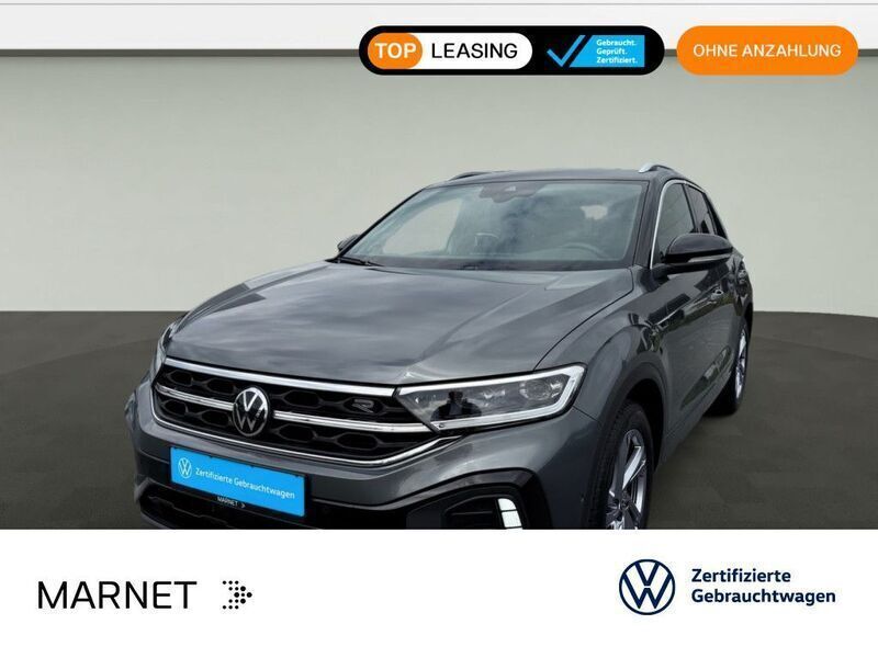 Indiumgrau metallic/schwarz Gebraucht 2024 VW T-Roc R-line SUV | 30.530 € (Guter Preis) - Bild 1/3