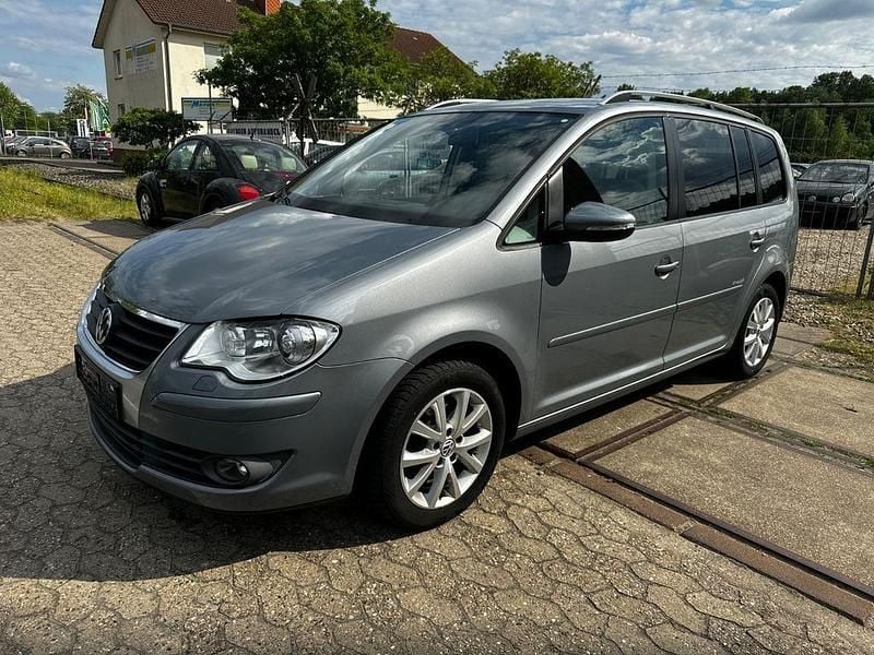 Grau Gebraucht 2010 VW Touran Freestyle Van / Kleinbus | 4.999 € (Superpreis) - Bild 1/4