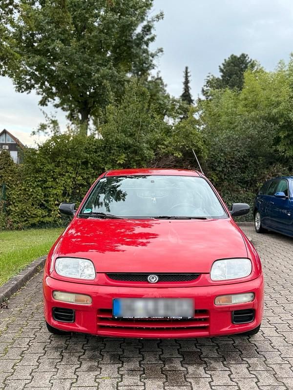 Rot Gebraucht 1997 Mazda 323 Coupé | 899 € - Bild 1/4