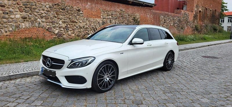 Weiß Gebraucht 2015 Mercedes C400 AMG line Kombi | 20.499 € (Fairer Preis) - Bild 1/4