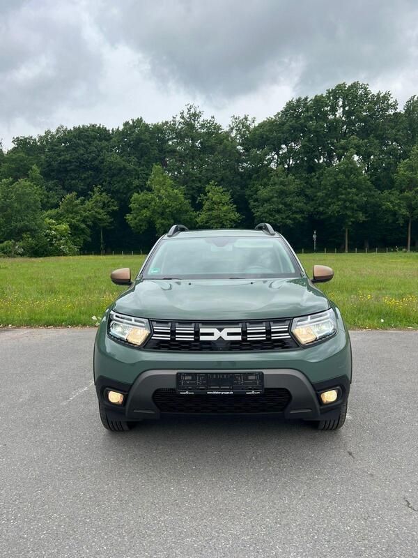 Grün Gebraucht 2024 Dacia Duster SUV | 23.450 € - Bild 1/4