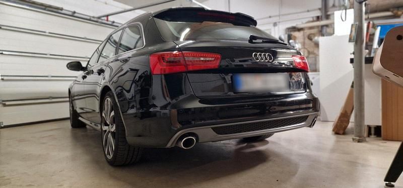 Używany Audi A6 Ambiente 245 KM (180 kW) 2014 Czarny Kombi