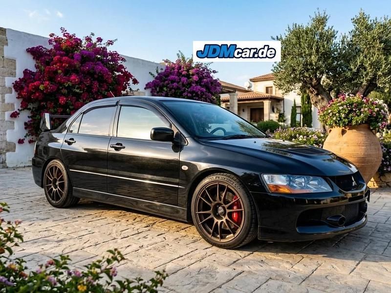 Second-hand Mitsubishi Lancer Evolution 320 CP (235 kW) 2004 Negru Berlinǎ