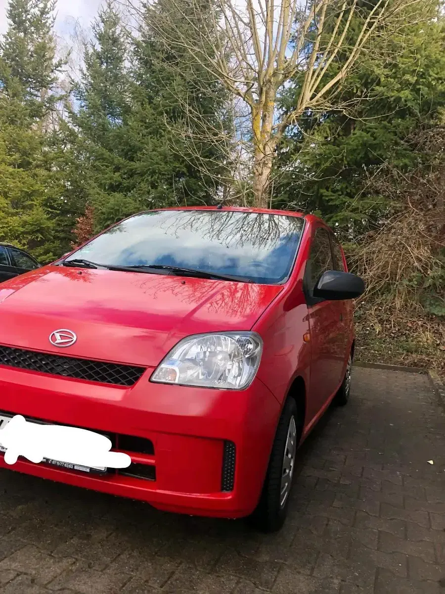 Gebraucht Daihatsu Cuore 53 PS (38 kW) 2004 Rot Kleinwagen