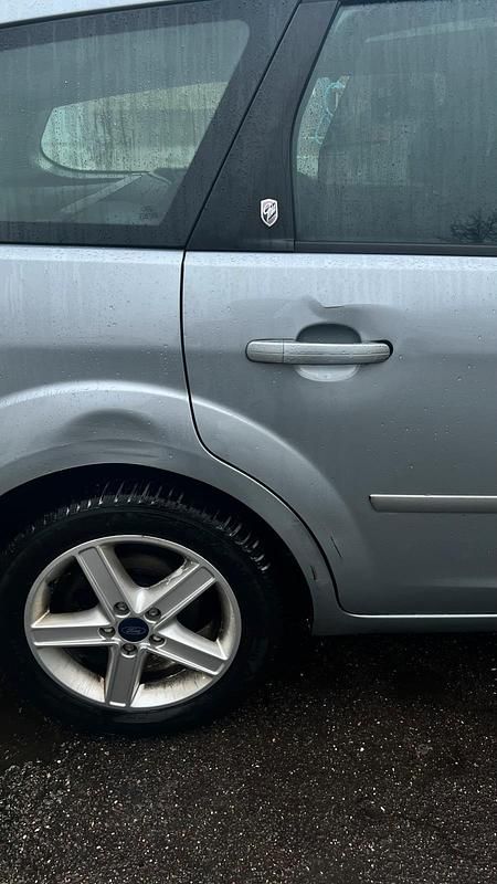 Gebraucht Ford Focus Ghia 116 PS (85 kW) 2005 Silber Kombi