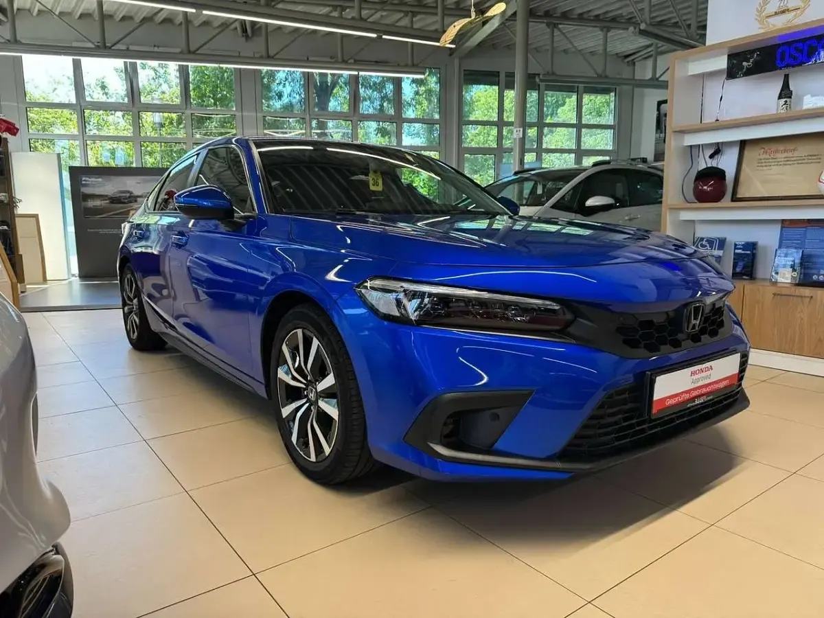 Gebraucht Honda Civic Elegance 184 PS (135 kW) 2024 Prem crystal blue m Limousine