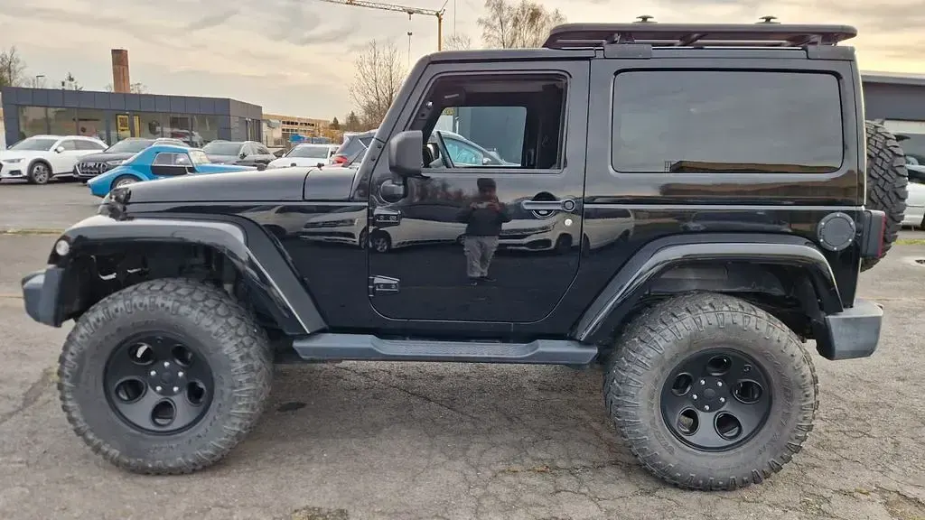 Gebraucht Jeep Wrangler Unlimited Sahara 200 PS (147 kW) 2013 Schwarz SUV