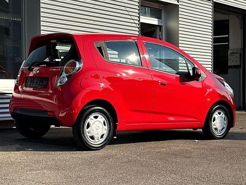 Second-hand Chevrolet Spark LS 68 CP (50 kW) 2011 Roșu Hatchback