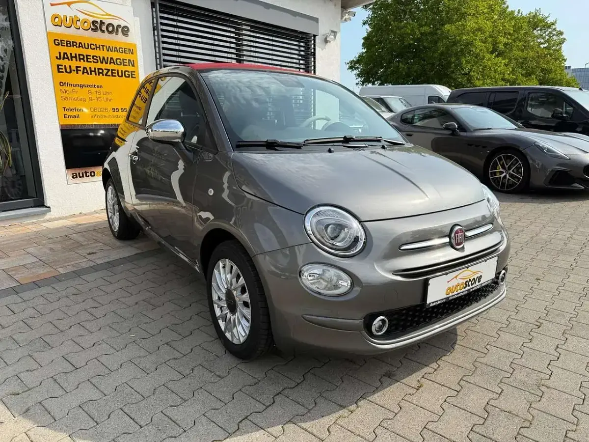 Gebraucht Fiat 500C Basis 69 PS (50 kW) 2023 Pompei grau / verdeck rot Cabrio