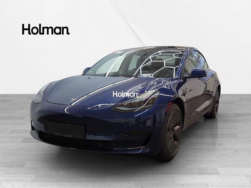 Blau Gebraucht 2022 Tesla Model 3 Standard Range Limousine | 25.174 € (Superpreis) - Bild 1/4